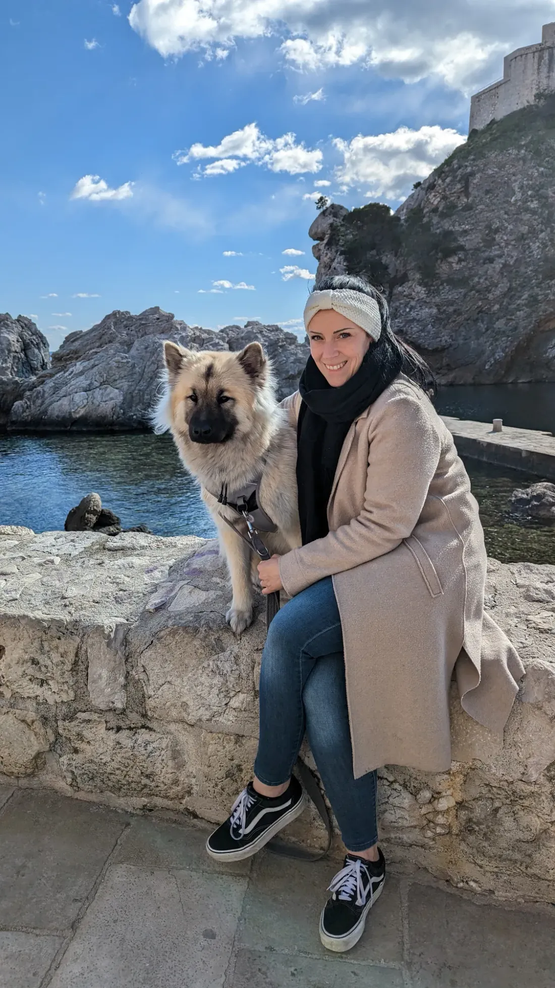 Sandra Walenta with her dog beside the Adriatic coast