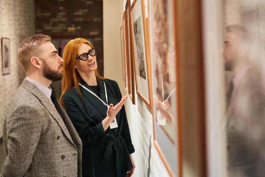 Visitors viewing art in a modern gallery